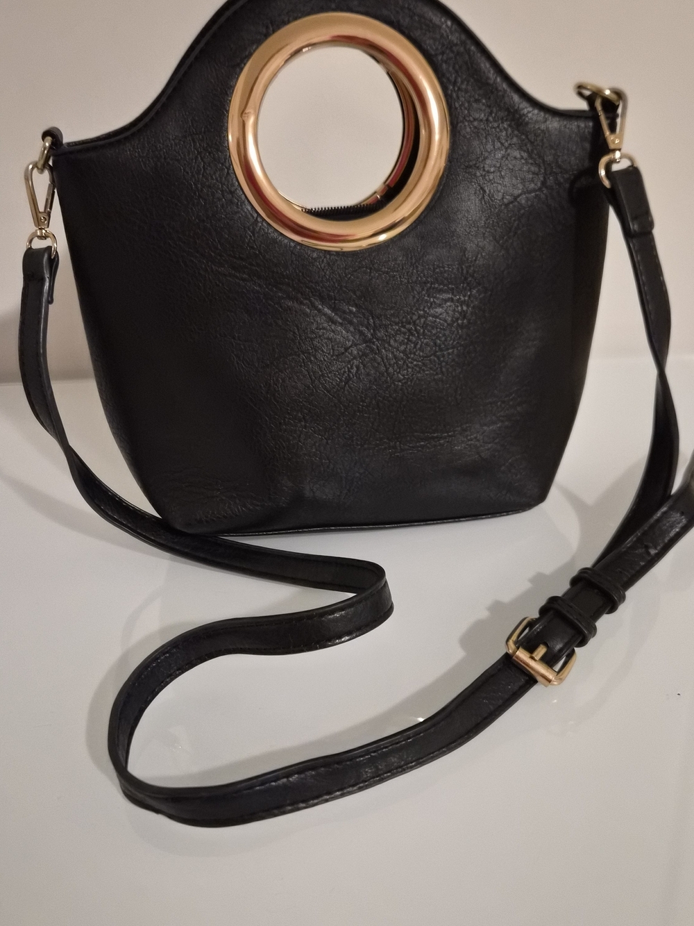 Elegant Black Shoulder Bag with Gold Ring Detail